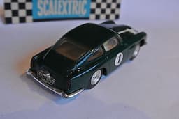 Scalextric Perfect green ASTON MARTIN DB4 + LIGHTS \'64 Fr. Slot car 100% origin