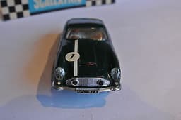 Scalextric Perfect green ASTON MARTIN DB4 + LIGHTS \'64 Fr. Slot car 100% origin