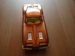 CORGI 310 CHEVROLET CORVETTE STINGRAY BRONZE EXTREMELY RARE ORIGINAL AND BOXED.
