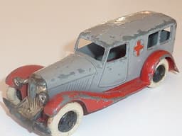 Pre war Dinky 24a Ambulance. Criss cross red chassis.