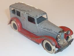 Pre war Dinky 24a Ambulance. Criss cross red chassis.