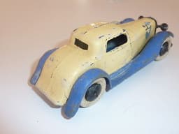 Pre war Dinky 24f Sportsmans Coupe in cream/blue with spare wheel.