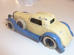 Pre war Dinky 24f Sportsmans Coupe in cream/blue with spare wheel.