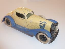 Pre war Dinky 24f Sportsmans Coupe in cream/blue with spare wheel.