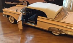 SUNSTAR 1:18 SCALE 5165 1959 MERCURY PARK LANE CONVERTIBLE DIECAST PINK
