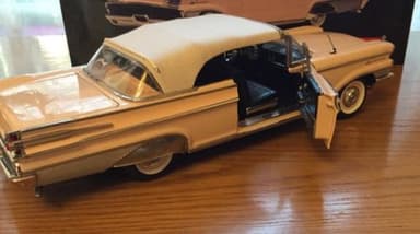 SUNSTAR 1:18 SCALE 5165 1959 MERCURY PARK LANE CONVERTIBLE DIECAST PINK