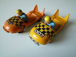 VINTAGE CORGI JUNIOR JAMES BOND 007 BOBSLEIGH MODELS ISSUED 1969 ONE OVERPAINTED