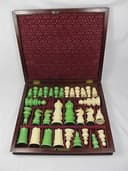 CASED ANTIQUE 19TH C ANGLO INDIAN CARVED CHESS SET IN GREEN AND WHITE CIRCA 1880