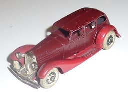 Superb pre war Dinky 24b limousine in maroon with red chassis.