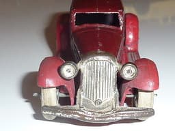 Superb pre war Dinky 24b limousine in maroon with red chassis.