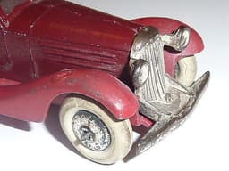 Superb pre war Dinky 24b limousine in maroon with red chassis.