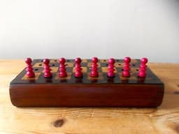antique travel chess set with bone pieces