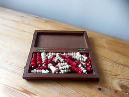 antique travel chess set with bone pieces