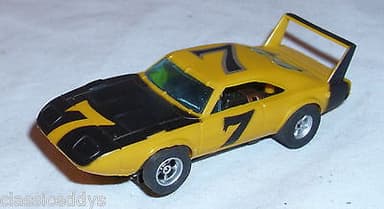 AURORA AFX G PLUS DODGE SUPER BIRD SLOT CAR IN YELLOW WORKS