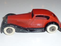 Pre war Dinky 24e Super Streamlined saloon. Second chassis. Tootsie wheels.