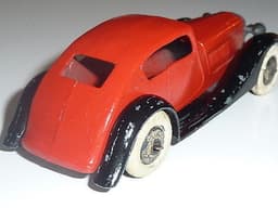 Pre war Dinky 24e Super Streamlined saloon. Second chassis. Tootsie wheels.