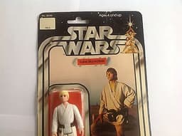 VINTAGE STAR WARS 1977 KENNER STAR WARS LUKE SKYWALKER 12 back unopened new moc