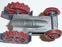 Pre war Dinky 22e Tractor in blue, yellow and red.