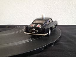 Aston martin D.B.4 GT Original Scalextric marshal