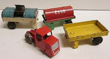 Dinky Toys pre-war 33a Mechanical Horse & assorted Trailers, part restored