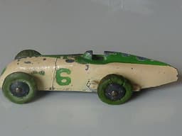 Pre war Dinky 23a racer. Very early type with no driver. Green tyres.