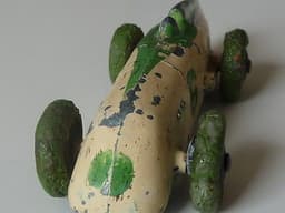 Pre war Dinky 23a racer. Very early type with no driver. Green tyres.