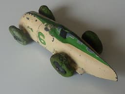 Pre war Dinky 23a racer. Very early type with no driver. Green tyres.