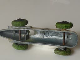 Pre war Dinky 23a racer. Very early type with no driver. Green tyres.