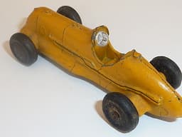 Pre war Dinky 35b racer. 1936 version with no driver. Yellow.