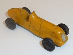 Pre war Dinky 35b racer. 1936 version with no driver. Yellow.