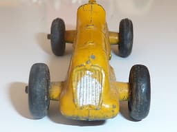 Pre war Dinky 35b racer. 1936 version with no driver. Yellow.