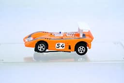 VINTAGE SLOT CAR AURORA / AFX ORANGE #54 MCLAREN with Spoiler HO Scale Excellent