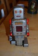 Original vintage 1960s SY Toys Japan mechanical walking tin robot sparking