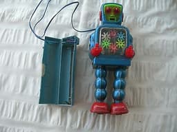 Vintage Tin-Plate Robot - Battery Operated. Made by Yoshiya ? in Japan.