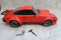 EXOTO PORSCHE 934RSR ORANGE RACING LEGENDS 1976 1:18 DANBURY MINT DIECAST