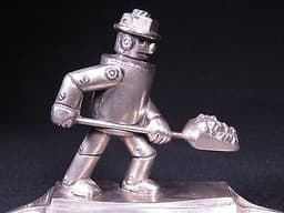 VINTAGE ART DECO THE IRON FIREMAN A.C.R. ADVERTISING ASHTRAY SPACE ROBOT TOY ART