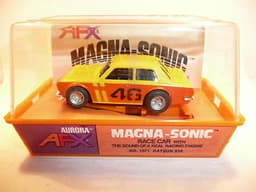 AURORA AFX SLOT CAR MINT IN ORIGINAL CASE. BANDED AND NEVER REMOVED FROM PACKAGE