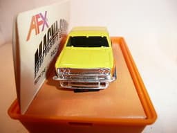 AURORA AFX SLOT CAR MINT IN ORIGINAL CASE. BANDED AND NEVER REMOVED FROM PACKAGE