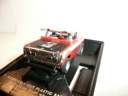 AURORA AFX SLOT CAR MINT IN ORIGINAL CASE. BANDED AND NEVER REMOVED FROM PACKAGE