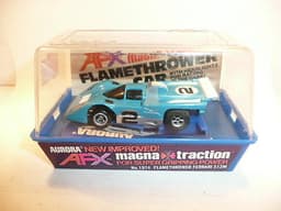AURORA AFX SLOT CAR MINT IN ORIGINAL CASE. BANDED AND NEVER REMOVED FROM PACKAGE