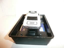 AURORA AFX SLOT CAR MINT IN ORIGINAL CASE. BANDED AND NEVER REMOVED FROM PACKAGE