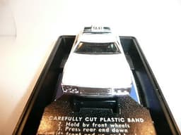 AURORA AFX SLOT CAR MINT IN ORIGINAL CASE. BANDED AND NEVER REMOVED FROM PACKAGE