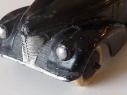 Pre war Dinky 39b Oldsmobile. Black with lacquered base. Very good.