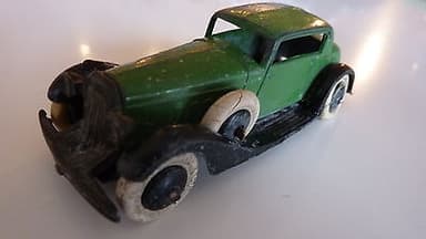 Pre war French Dinky 24d Vogue saloon with spare wheel.